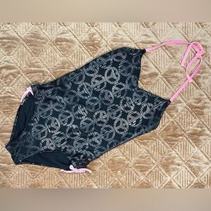 Super cute girl’s one piece Black/silver peace sign with pink tie strings.